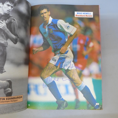 707 - Football; a Topical Times football book 1994 containing thirty-one signatures from former footballer... 