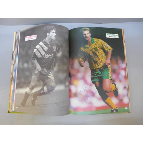 707 - Football; a Topical Times football book 1994 containing thirty-one signatures from former footballer... 