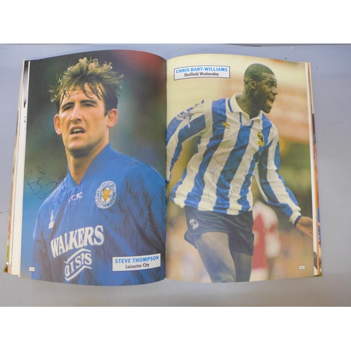 707 - Football; a Topical Times football book 1994 containing thirty-one signatures from former footballer... 