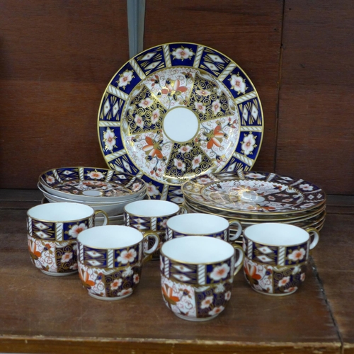 714 - Royal Crown Derby Imari 2451 pattern tea ware, (three sizes of cups, two cups cracked) **PLEASE NOTE... 