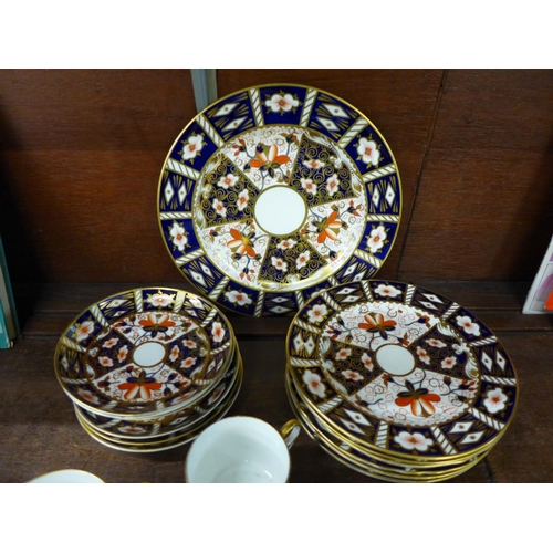 714 - Royal Crown Derby Imari 2451 pattern tea ware, (three sizes of cups, two cups cracked) **PLEASE NOTE... 