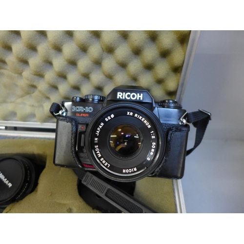 780 - A Ricoh KR-10 camera and lenses in case