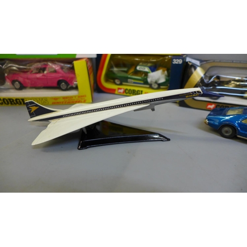 781 - A collection of Corgi model vehicles including Concorde, John Player's Lotus, Bentley and 350SL