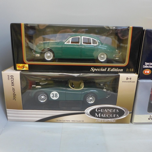 788 - Four 1/18th scale model Jaguar cars, including Ertl and Sun Star