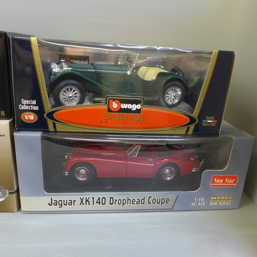 788 - Four 1/18th scale model Jaguar cars, including Ertl and Sun Star