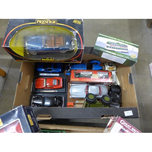 799 - A collection of model vehicles including Burago, Matchbox, Tonka, Prestige Solido Rolls-Royce, boxed... 