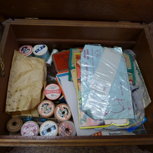 814 - A vintage sewing set in wooden box