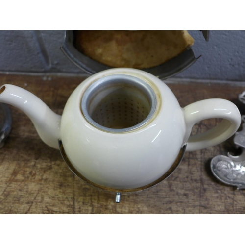 819 - Two chrome metal teapots