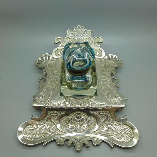 820 - An Art Nouveau style ink stand with glass ink bottle