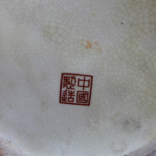 821 - An oriental ceramic pot with lid