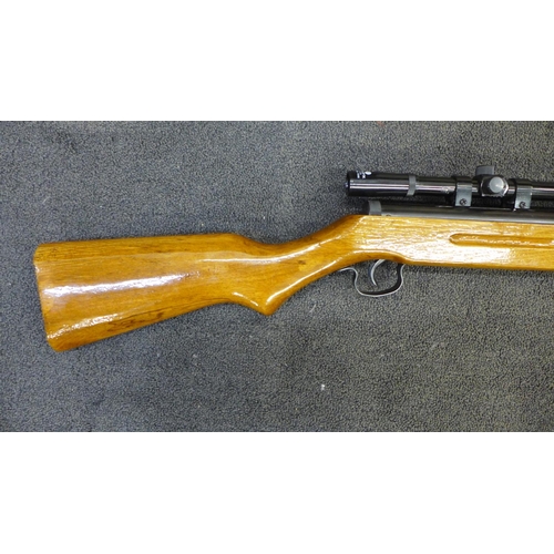 829 - An air rifle with 4 x 15 scope