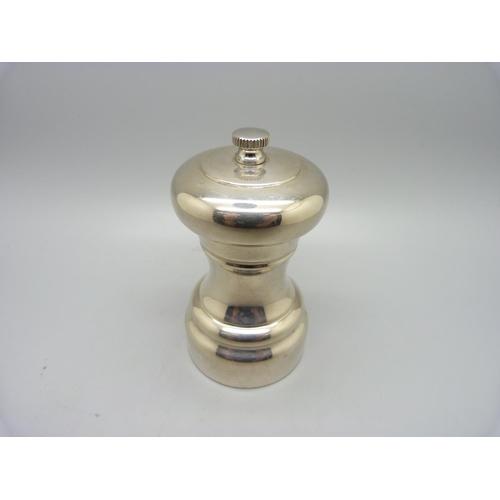 858 - A silver pepper grinder