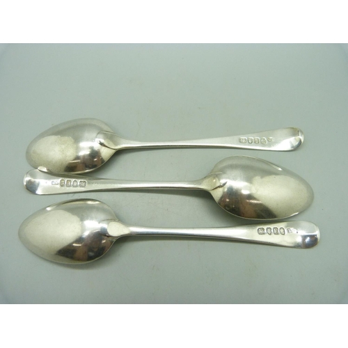 860 - Three Georgian silver spoons, a pair London 1801 and one other, 96g