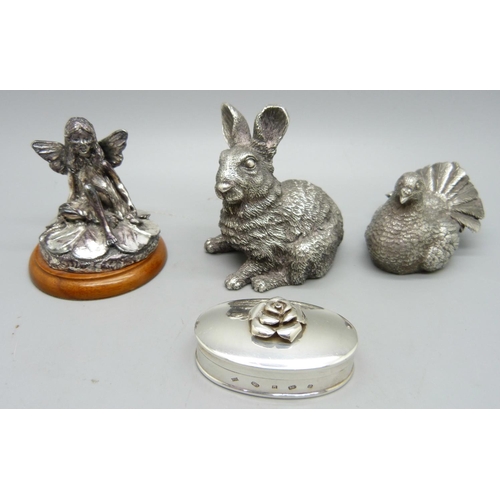 868 - A silver trinket pot, a silver covered rabbit and bird figure, and a fairy figure