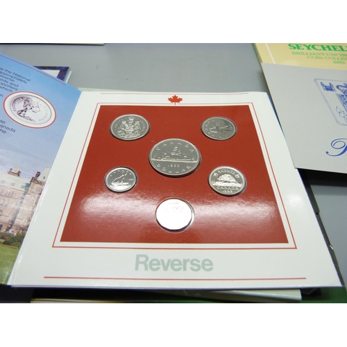 873 - Seven coin packs; four UK, Canada, Seychelles and Australia's