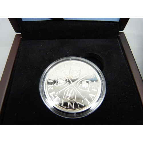 879 - Two silver proof coins, Heraldic crown and Platinum Wedding Anniversary 50p coin, both boxed