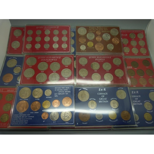 883 - A collection of sixteen UK coin sets