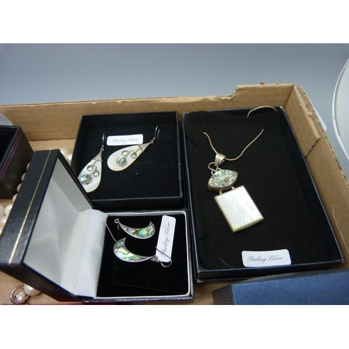 886 - A collection of silver and silver mounted jewellery including some set with abalone and mother of pe... 