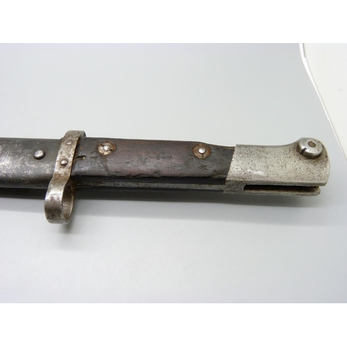 890 - A WWII bayonet with scabbard, marked CSZ