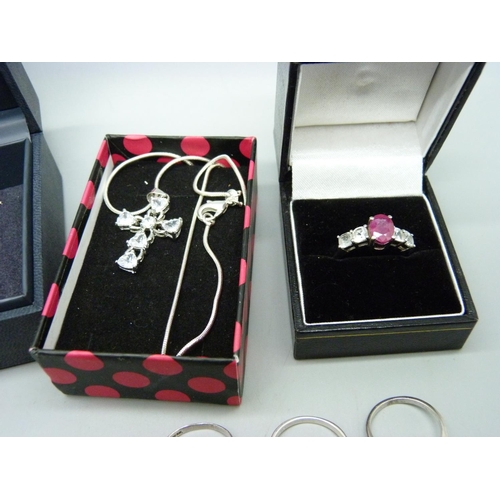 902 - Silver jewellery including a cameo brooch, ring and earring set, stone set rings, etc.