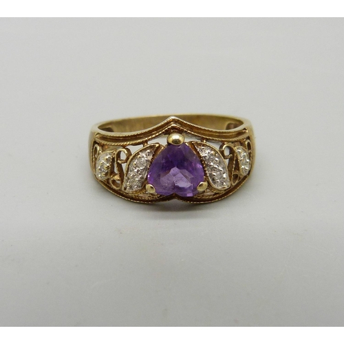 936 - A 9ct gold, amethyst and diamond ring, 3.2g, O