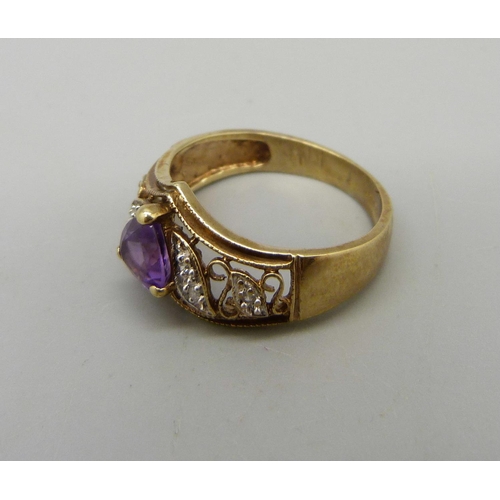 936 - A 9ct gold, amethyst and diamond ring, 3.2g, O