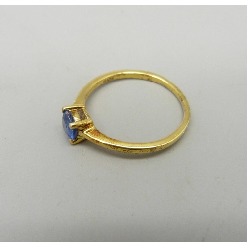 943 - A silver gilt, kyanite solitaire ring, N