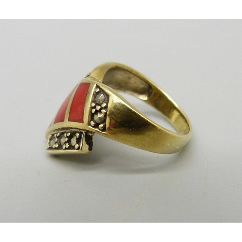 944 - A silver gilt, red coral and marcasite ring, M