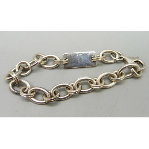 945 - A Calvin Klein silver bracelet, 22g