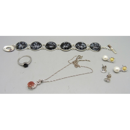 958 - Two pairs of silver earrings, a silver ring, a silver pendant and chain and a bracelet