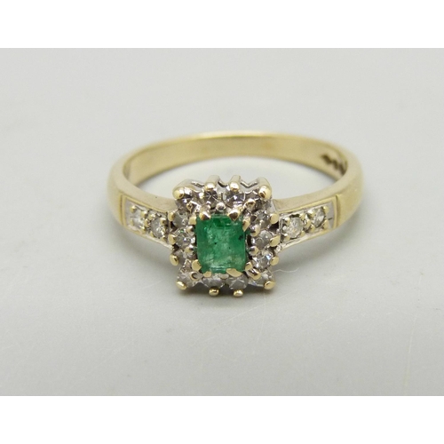 964 - A 9ct gold, emerald and diamond ring, 2.3g, K