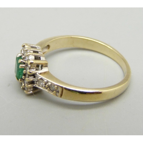 964 - A 9ct gold, emerald and diamond ring, 2.3g, K