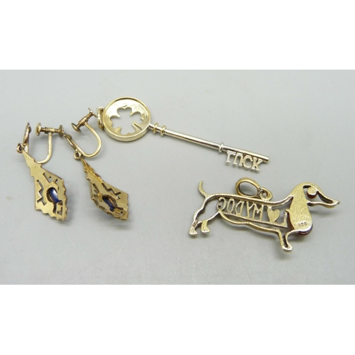 982 - A pair of vintage Art Deco earrings and two silver gilt pendants