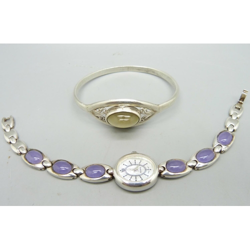 986 - A silver wristwatch and a bangle