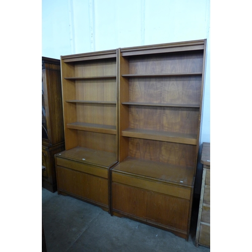 106 - A pair of teak bookcases