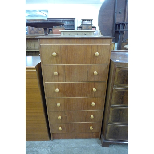 118 - A teak chest of drawers and a simulated teak chest of drawers