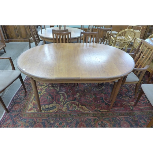 124a - A G-Plan Fresco teak extending dining table and six chairs