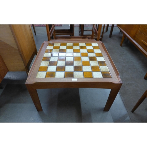 126 - A Danish Trioh teak and tiled top coffee table