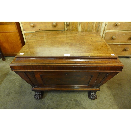 147 - A George IV mahogany sarcophagus shaped wine cooler