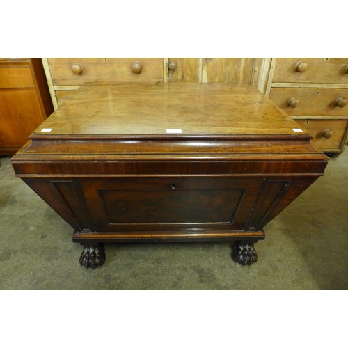 147 - A George IV mahogany sarcophagus shaped wine cooler