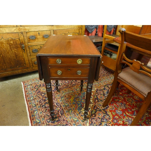 15 - A George IV mahogany drop leaf three drawer night stand