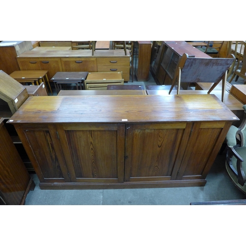 158 - A Victorian pitch pine four door kitchen cupboard