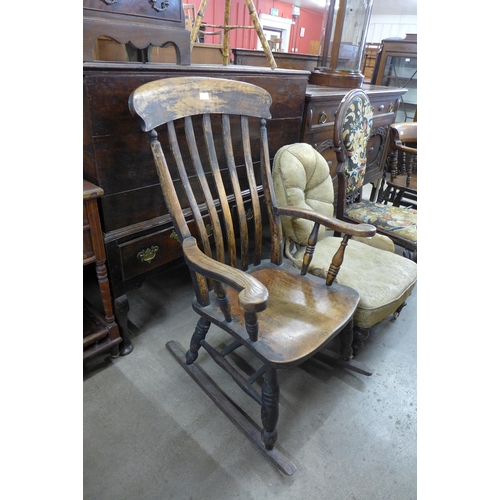 165 - A Victorian elm and beech farmhouse rocking chair