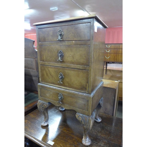 182 - A small Queen Anne style figured walnut chest on stand