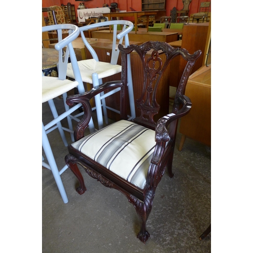 193 - A Chippendale style mahogany elbow chair