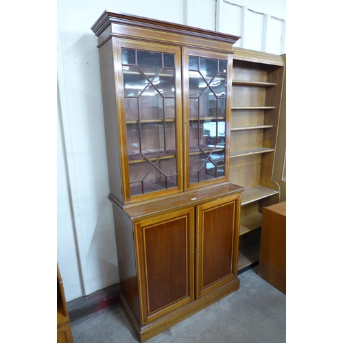 196 - An Edward VII inlaid mahogany bookcase