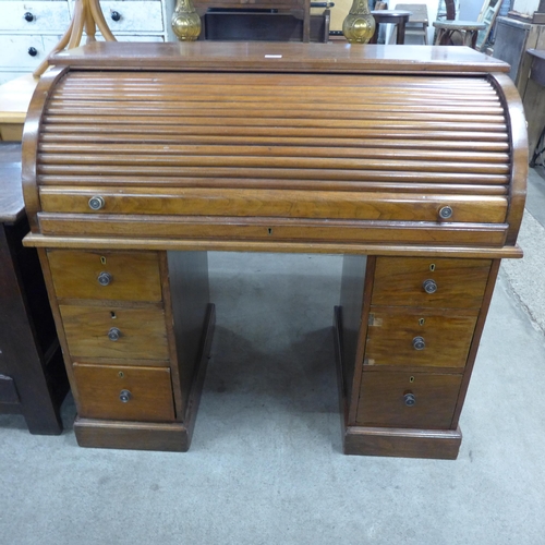 208 - A Victorian tambour roll top pedestal desk