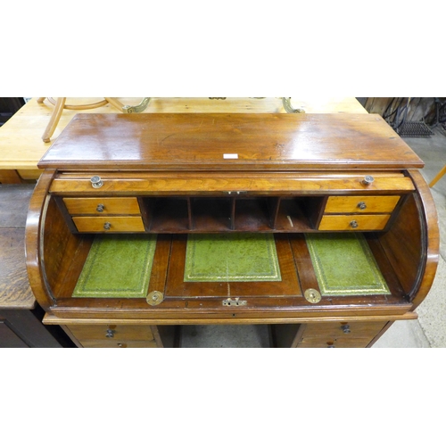 208 - A Victorian tambour roll top pedestal desk