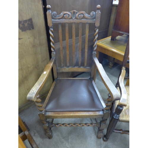 242 - A pair of early 20th Century oak barleytwist carver chairs and a George III style elm spindle back c... 