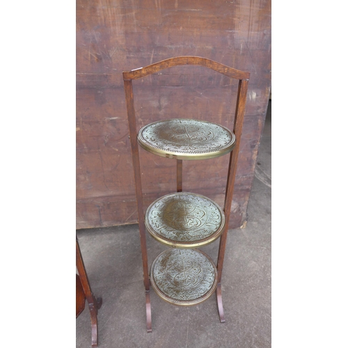 278 - A mahogany and brass Islamic pattern cake stand and an oak cake stand